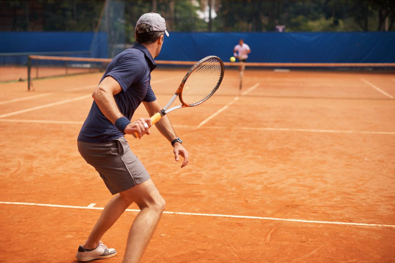 Tennis_Spieler_Sandplatz